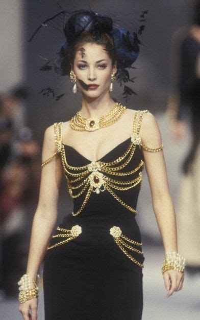 christy turlington chanel chain dress.